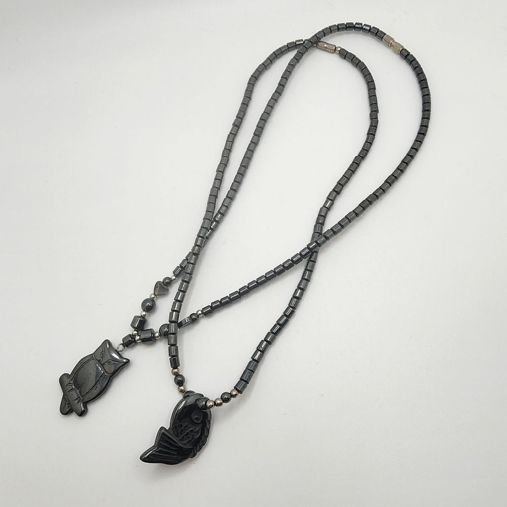 HEMATITE NECKLACES WITH AN OWL AND A FISH. SCREW FASTENING